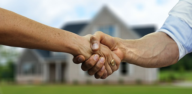 purchase property, shaking hands