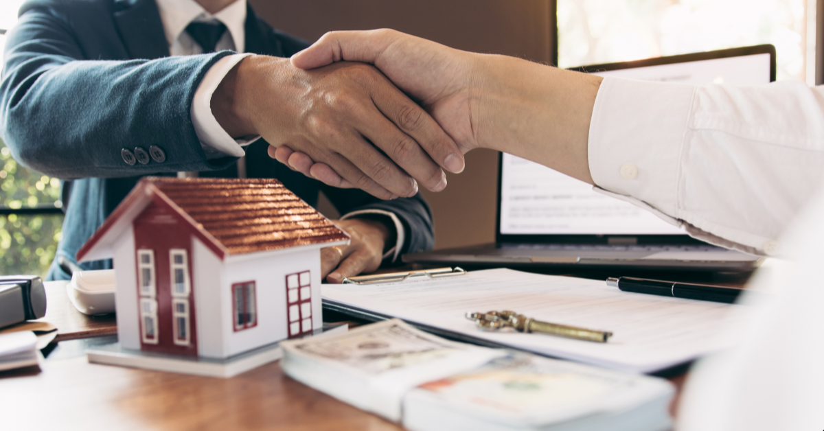 Investment properties Two person handshaking for having a successful property deal