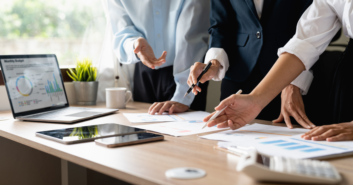 Property investment Strategies - 3 people discussing property investment strategies - featured image