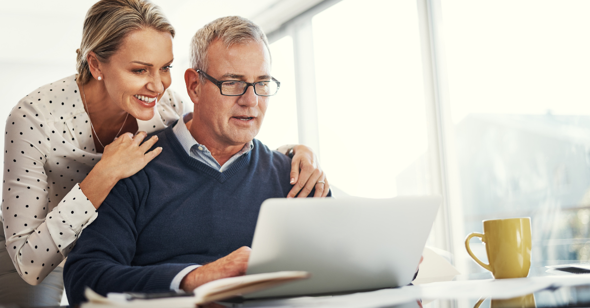 SMSF Retirement Phase - Old couples looking into laptop screen and smiling