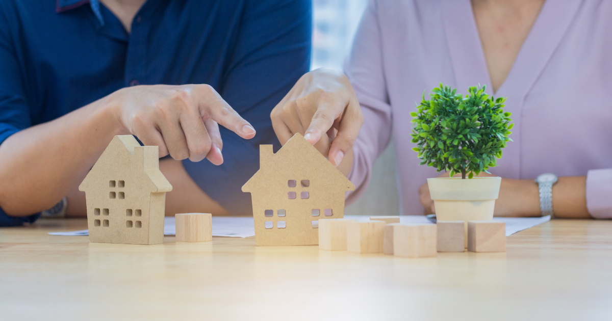 a couple is choosing a property from other property options