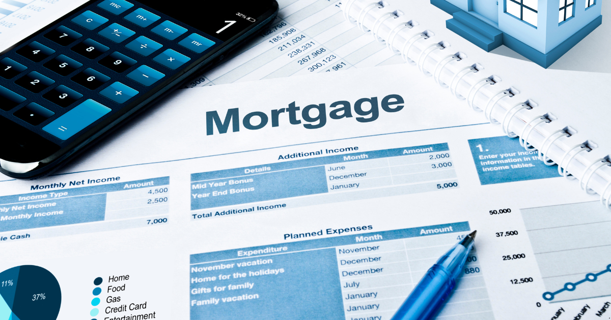 a financial document of mortgage with a calculator on table