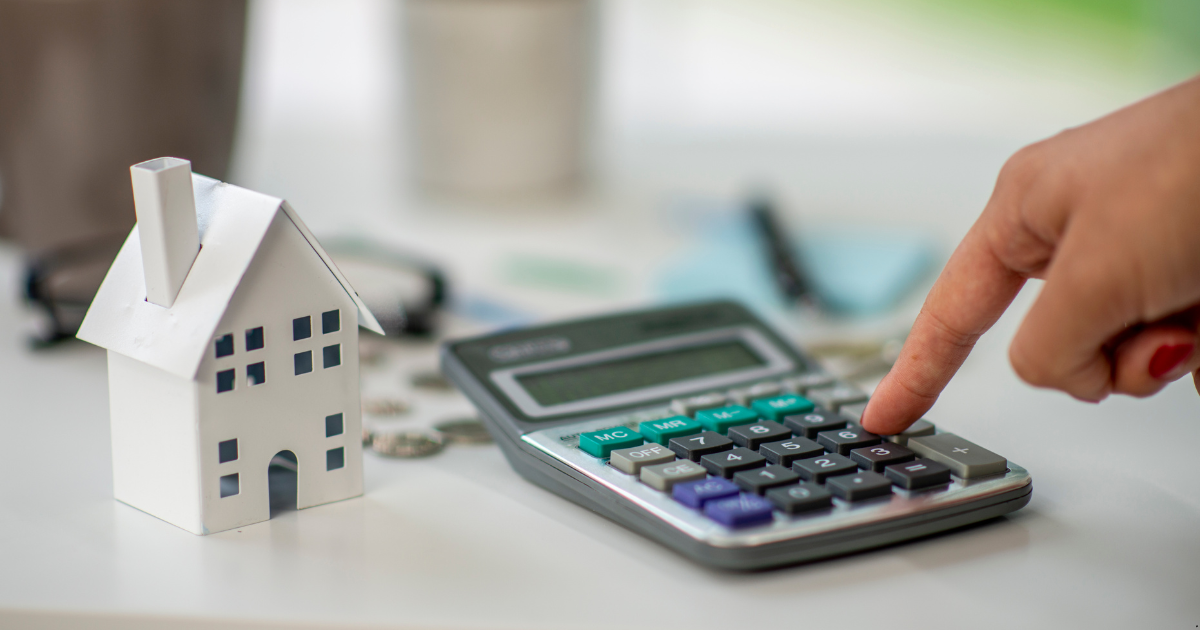 a property investor is calculating his mortgage payment using a calculator